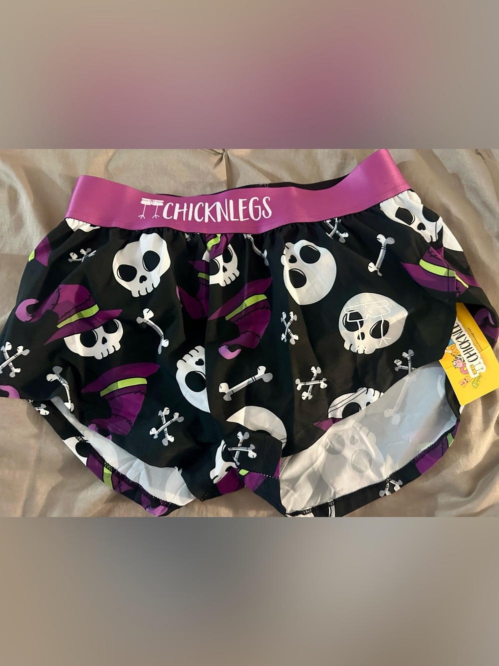 ChicknLegs Women’s Black Skull Print Athletic Shorts with Pink Waistband
